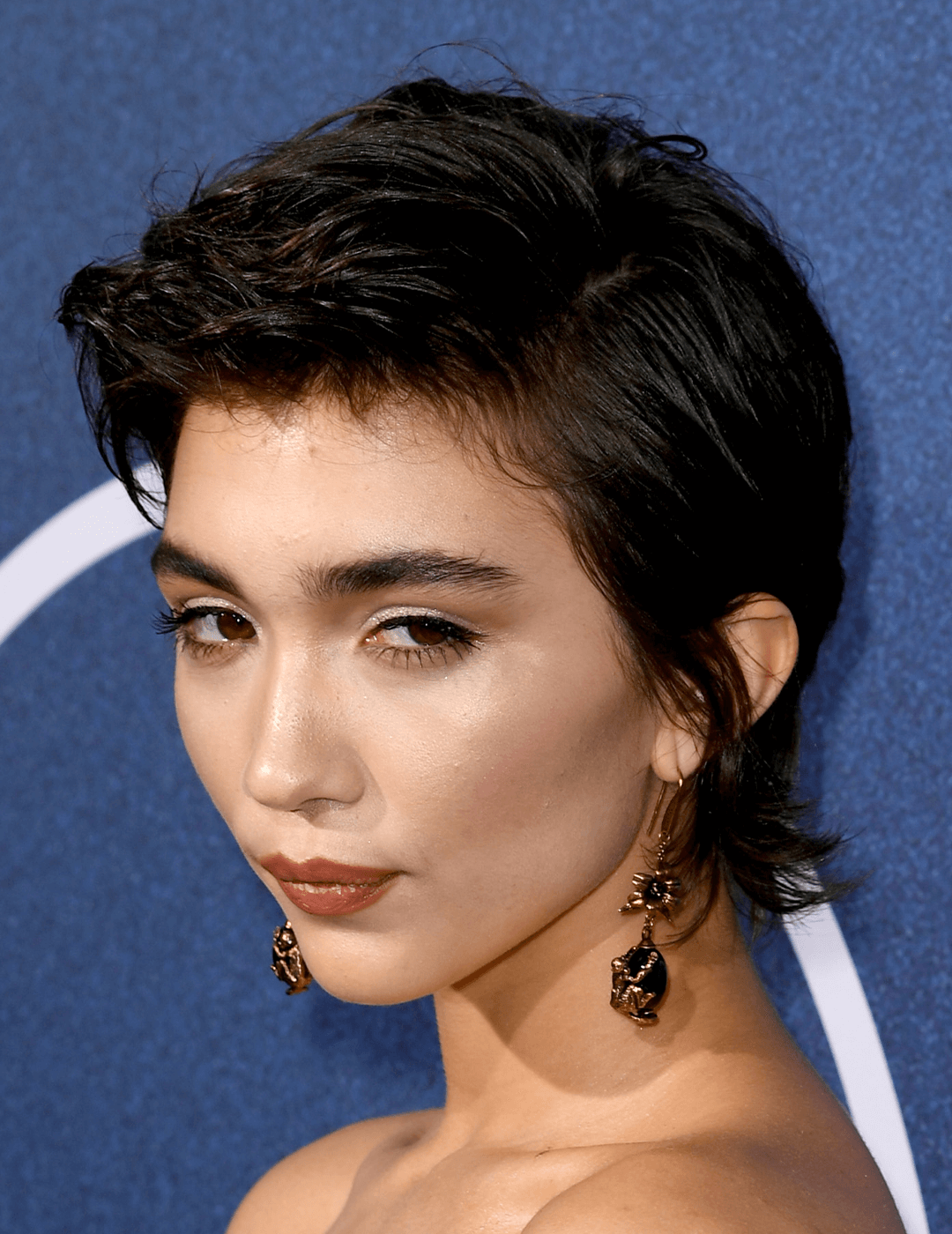 Rowan Blanchard rocking a short hairstyle with long sideburns Desktop