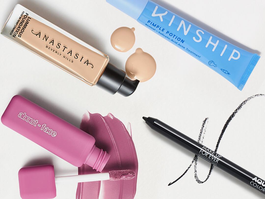 Four makeup and skincare products swatched on white background Desktop