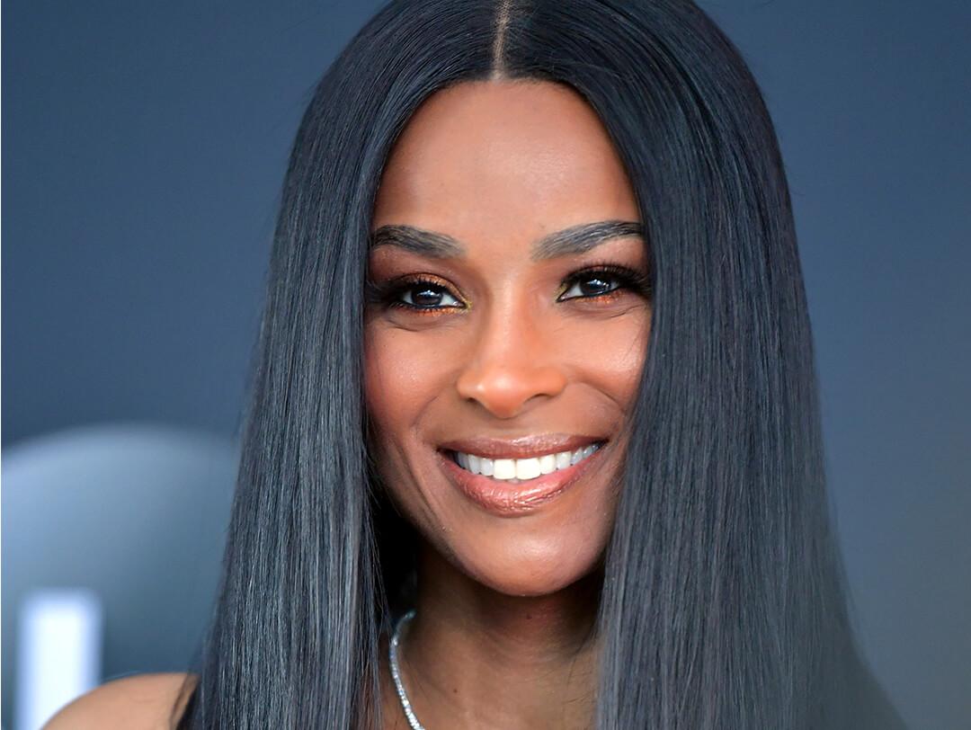 A photo of Ciara with a super long lob hairstyle wearing a white necklace Desktop