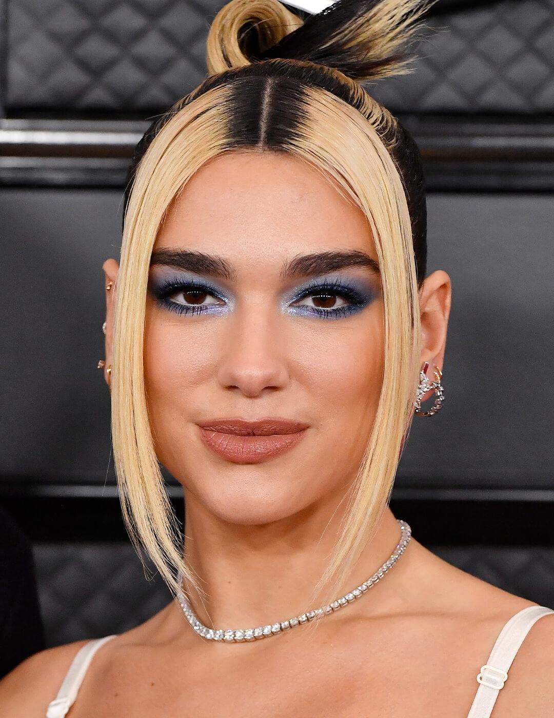 Dua Lipa rocking pastel blue eyeshadow makeup look on the red carpet Desktop