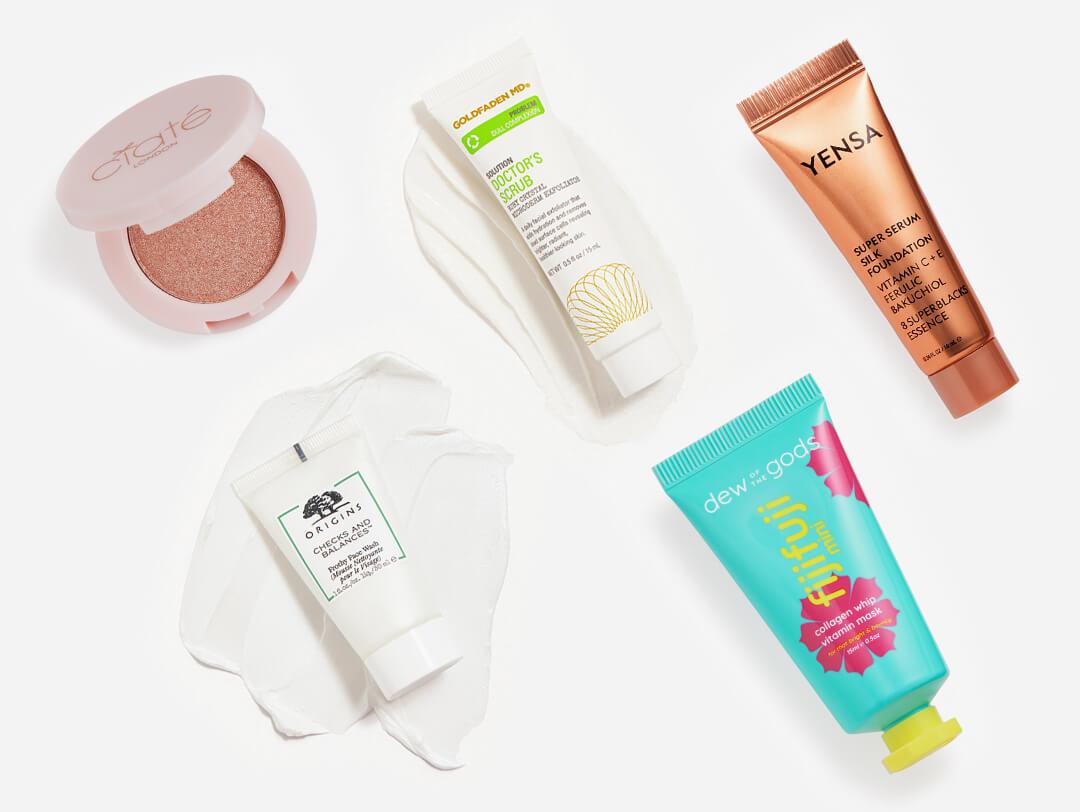 Makeup and skincare products from the August 2022 IPSY Glam Bag swatched on white background Desktop