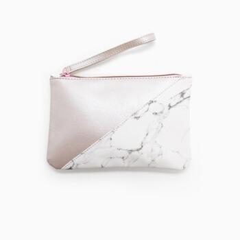 The January Glam Bag Plus design features a chic rose gold and marble pattern. Mobile