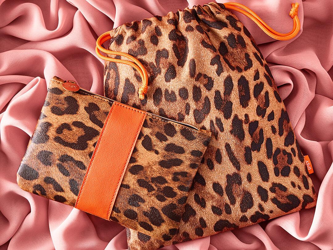 November 2022 IPSY Glam Bag and Glam Bag Plus bags on pink velvet cloth Desktop