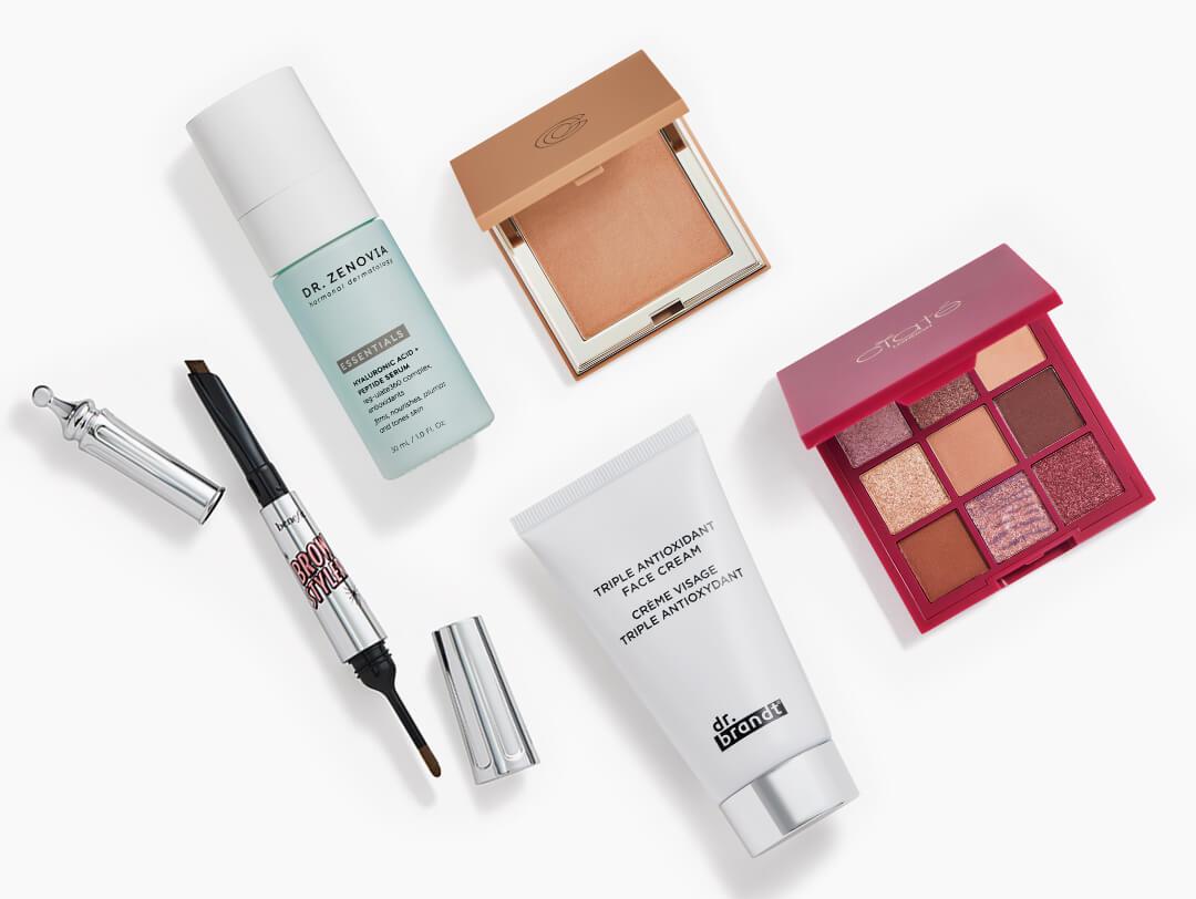 Makeup and skincare products from the June 2022 IPSY Glam Bag Plus on white background Desktop