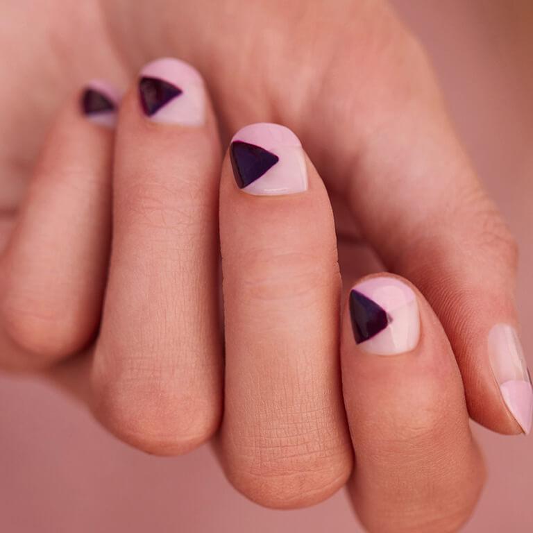 An image of a light pink and dark purple geometric nail art manicure Desktop