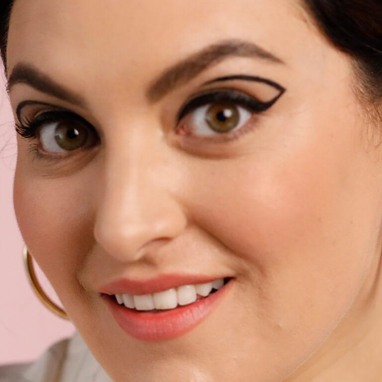 An image of a model rocking a negative space eyeliner look Desktop