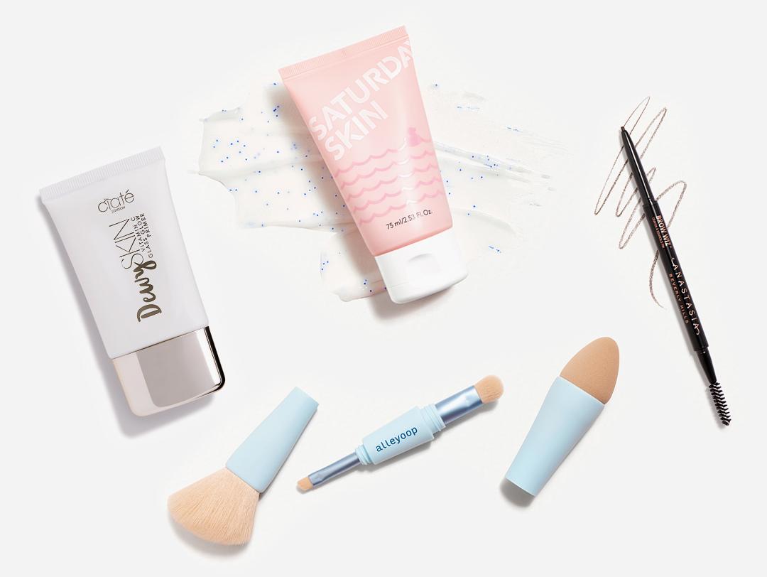Makeup and skincare products and tools from the March 2022 IPSY Glam Bag Plus swatched on white background Desktop