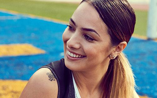 Lynette Cynée smiles after her workout. Mobile