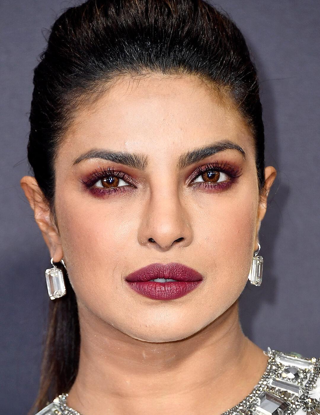 Close-up of Priyanka Chopra rocking a burgundy smoky eye makeup look Mobile