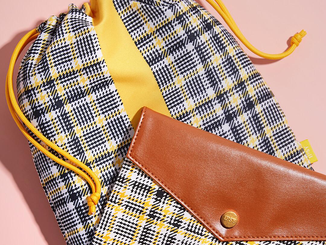 September 2021 IPSY Glam Bag and Glam Bag Plus bags on pink background Desktop