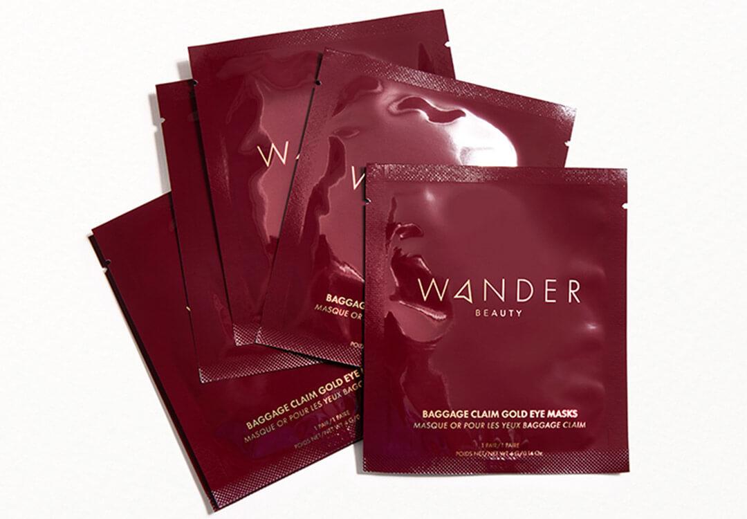 WANDER BEAUTY Baggage Claim Eye Masks in Gold Desktop