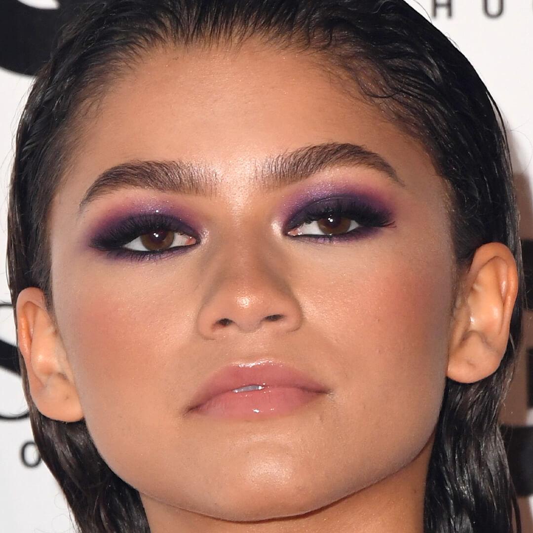 Close-up image of Zendaya rocking dark purple smokey eye look Desktop