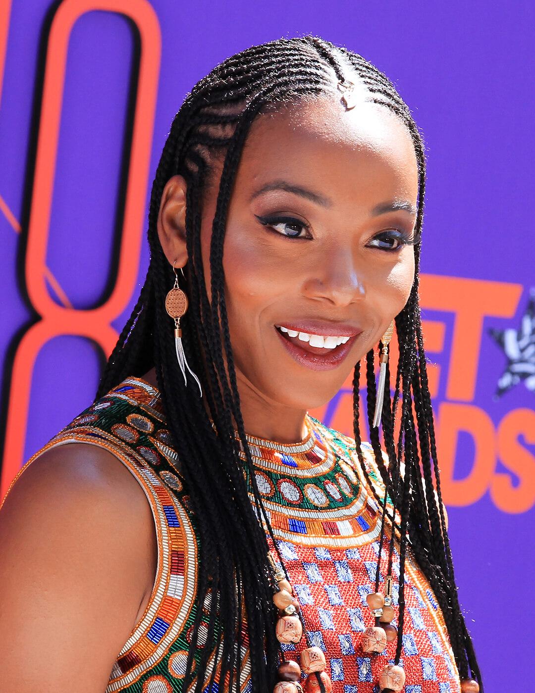 Erica Ash rocking a long, braided hairstyle Desktop