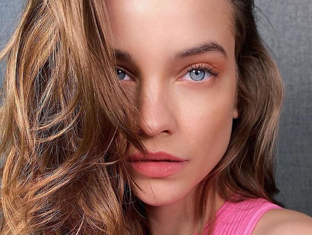 A photo of a model with a matte eyeshadow look wearing a pink tank top Desktop