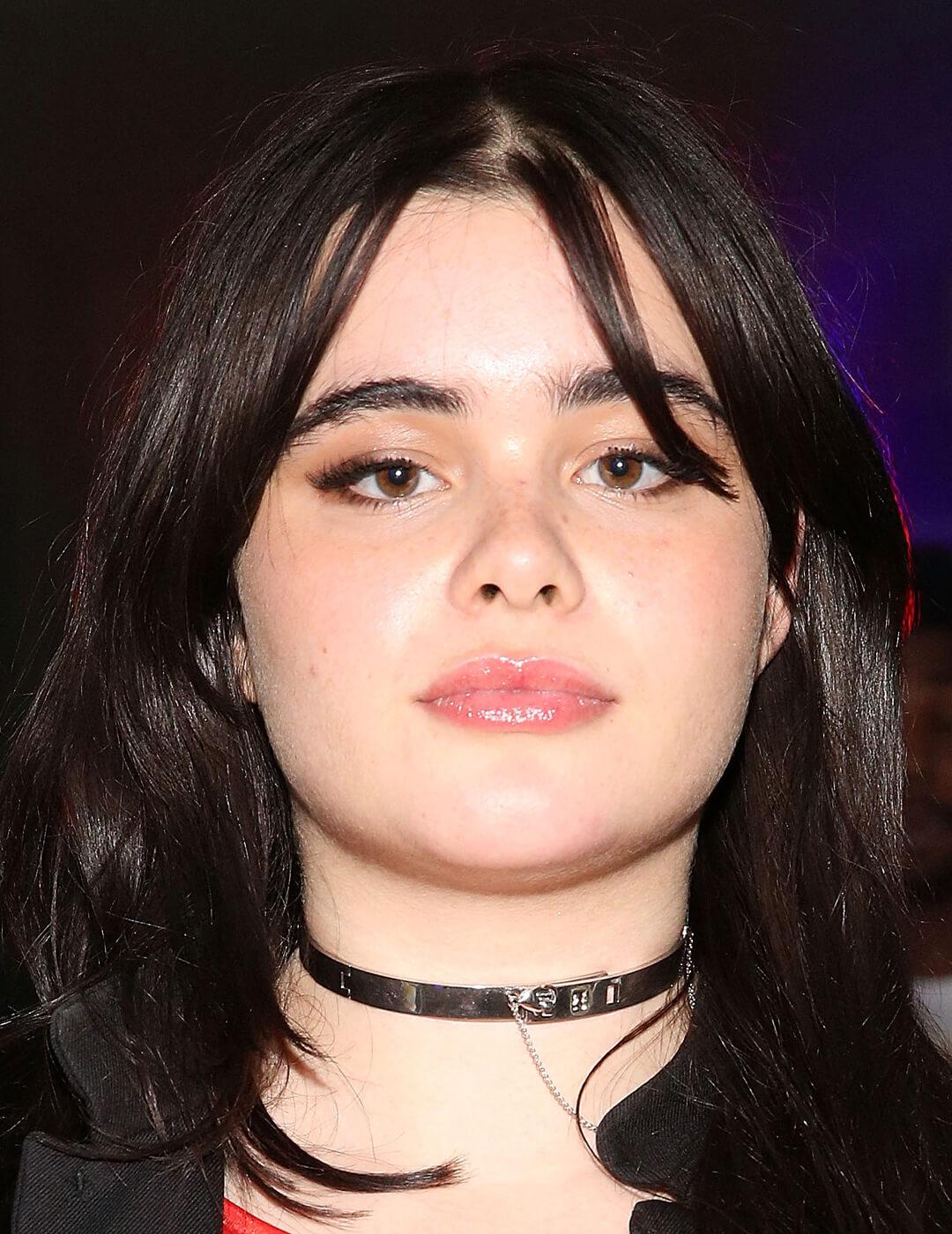 Barbie Ferreira rocking a graphic eyeliner look paired with glossy lips Desktop