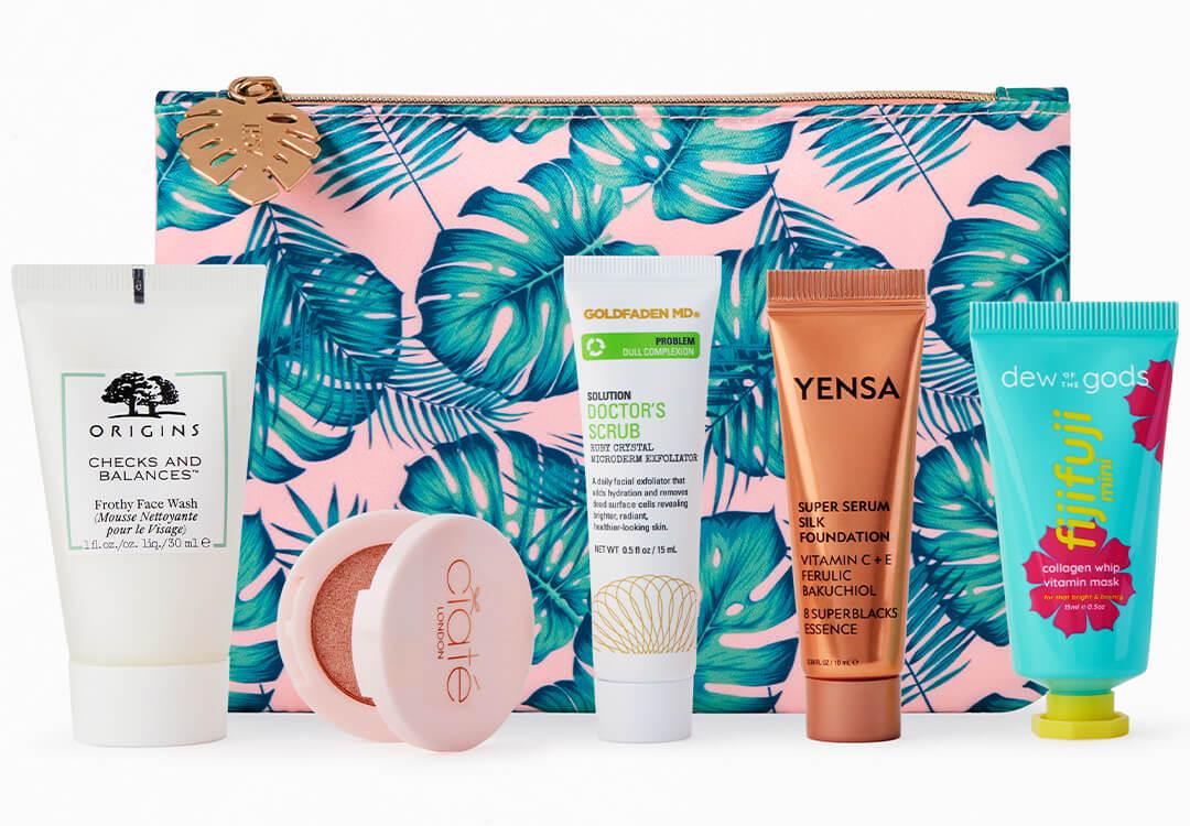 Beauty products from various brands in front of August 2022 IPSY Glam Bag against white background Mobile