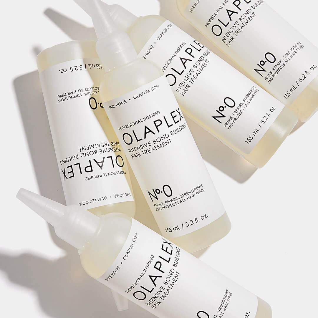 A photo of OLAPLEX No.0 Intensive Bond Building Treatment bottles on a white background Desktop