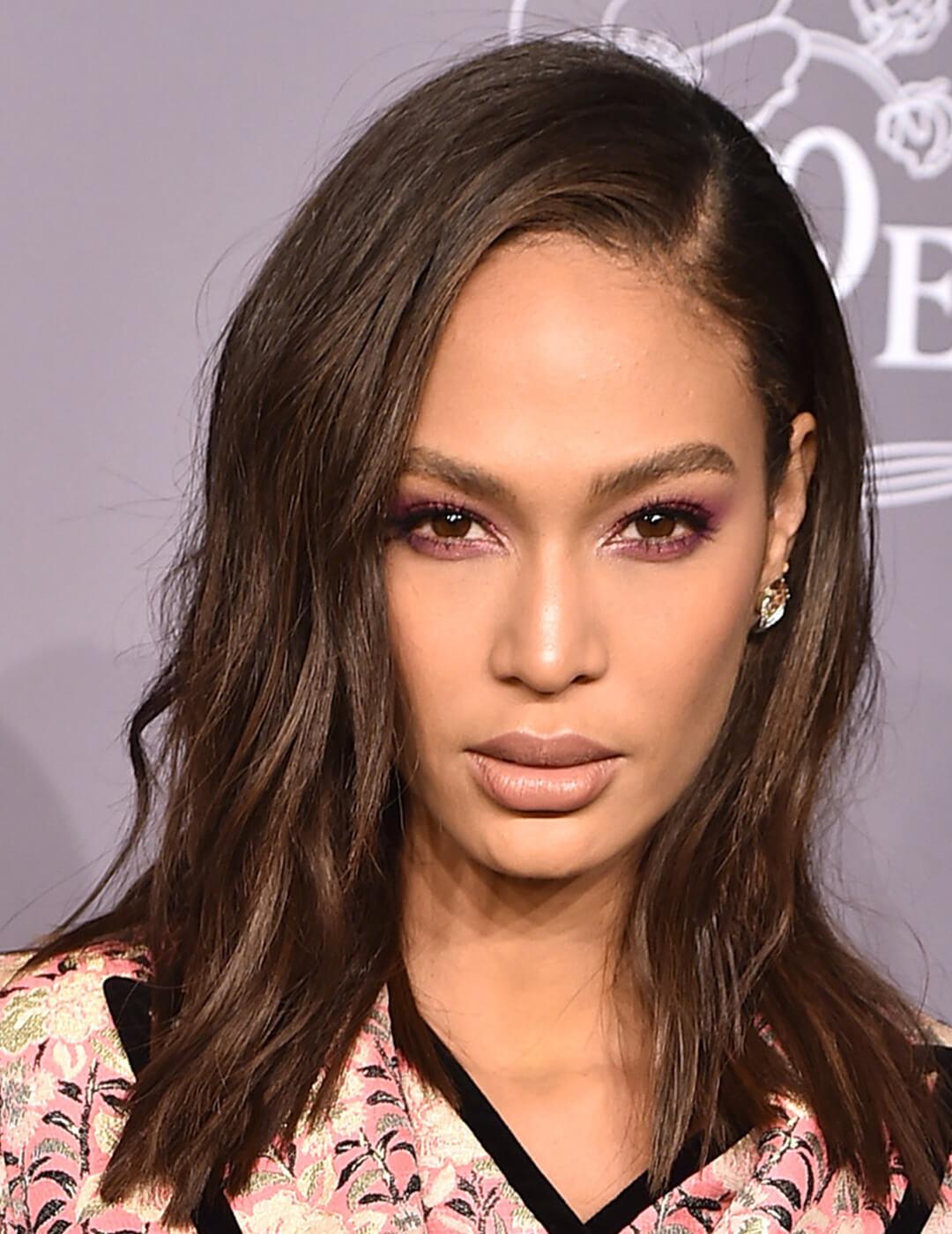 A photo of Joan Smalls with a smooth shag Mobile