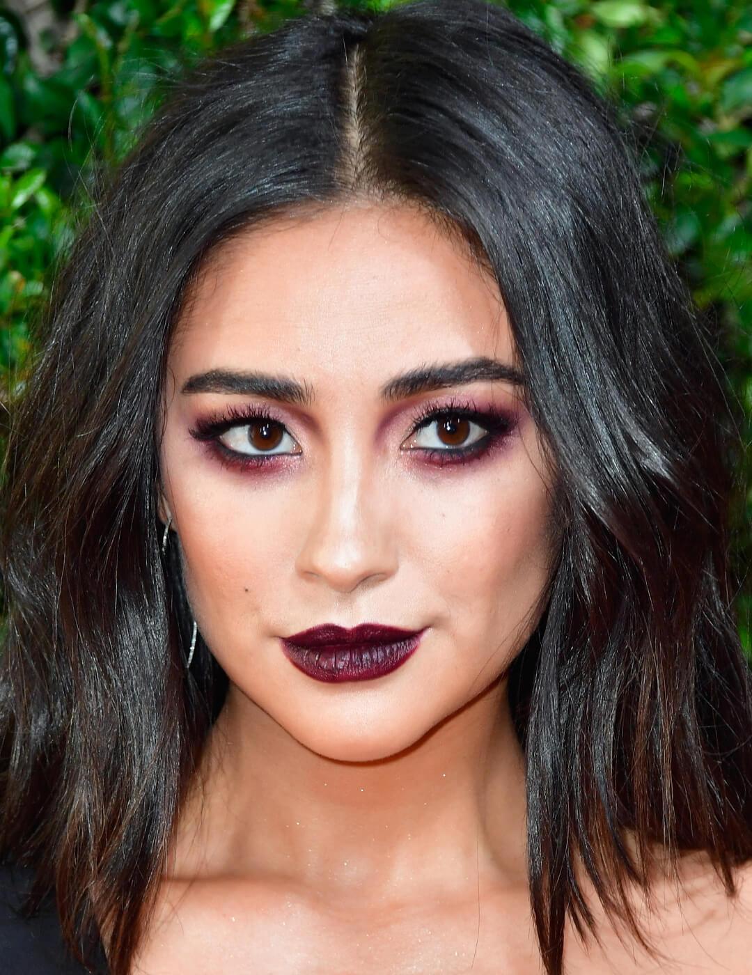 Shay Mitchell rocking a dark berry grunge makeup look Mobile