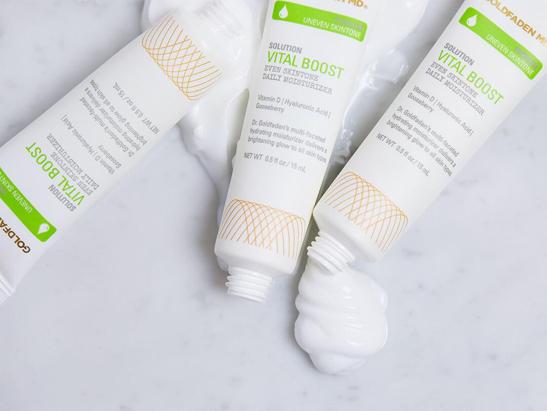 An image of three GOLDFADEN MD Vital Boost Even Skintone Daily Moisturizers swatched Desktop