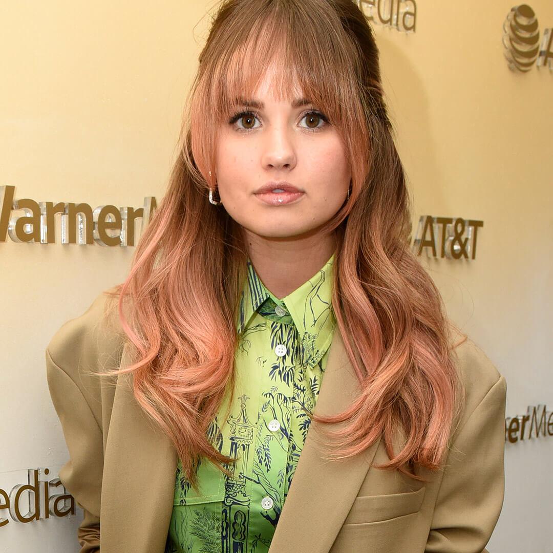 A photo of Debby Ryan with rose gold hair Mobile