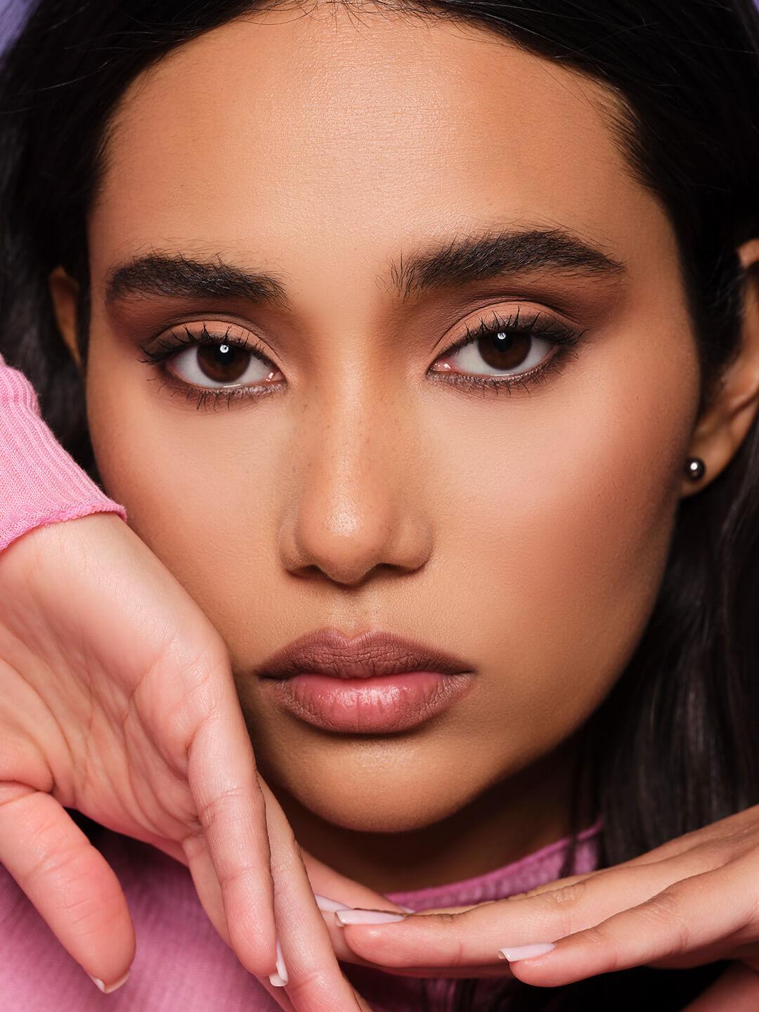 Portrait of a model rocking a sultry eye makeup look by Ash K Holm Desktop