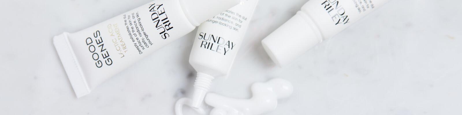 Close-up image of three SUNDAY RILEY Good Genes All-In-One Lactic Acid Treatments swatched Desktop