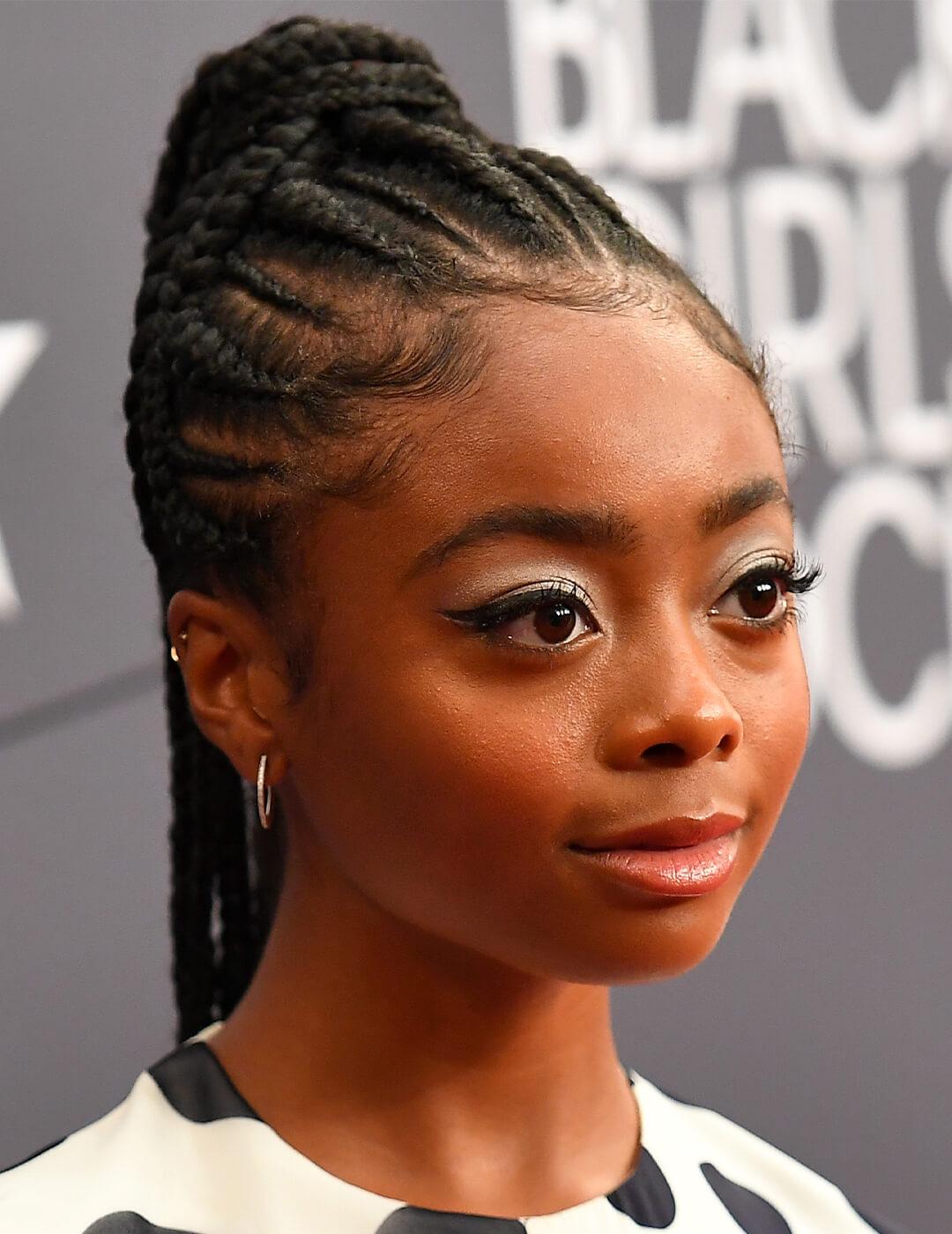 Skai Jackson rocking a braided high ponytail hairstyle Mobile