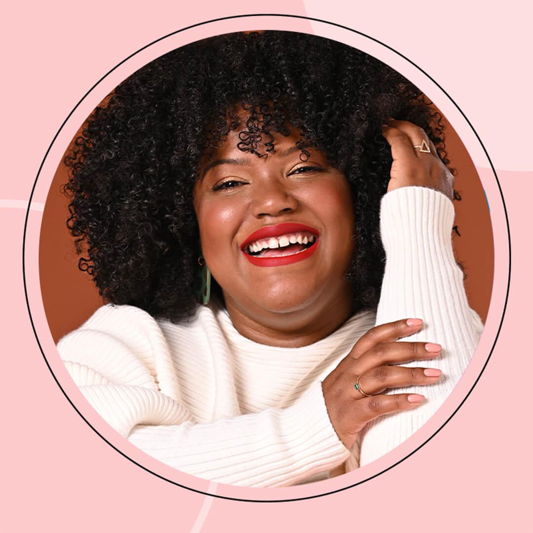 Carolina Contreras posing and smiling in pink frame Mobile