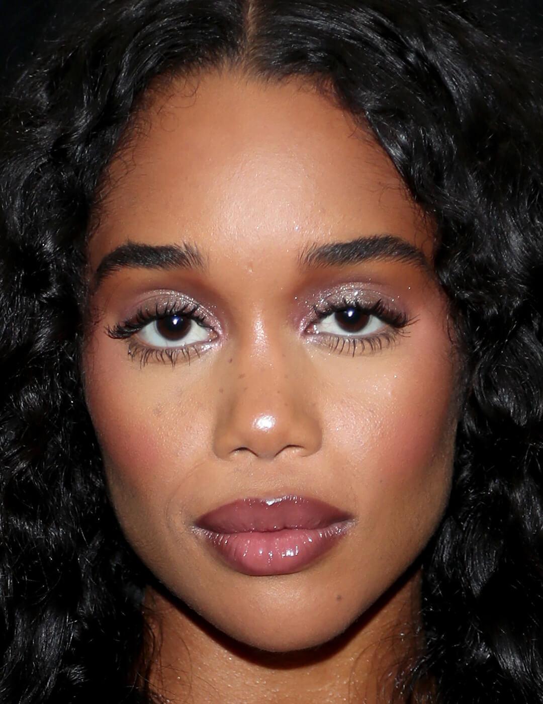 Close-up of Laura Harrier looking glam with a berry makeup look Mobile
