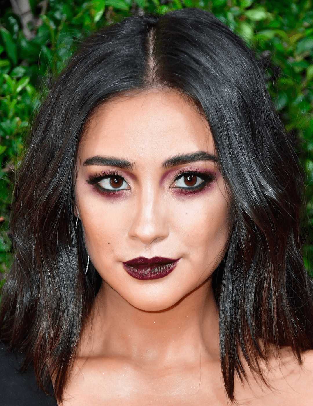 Close-up of Shay Mitchell rocking a deep berry eyeshadow look and deep burgundy lipstick Desktop
