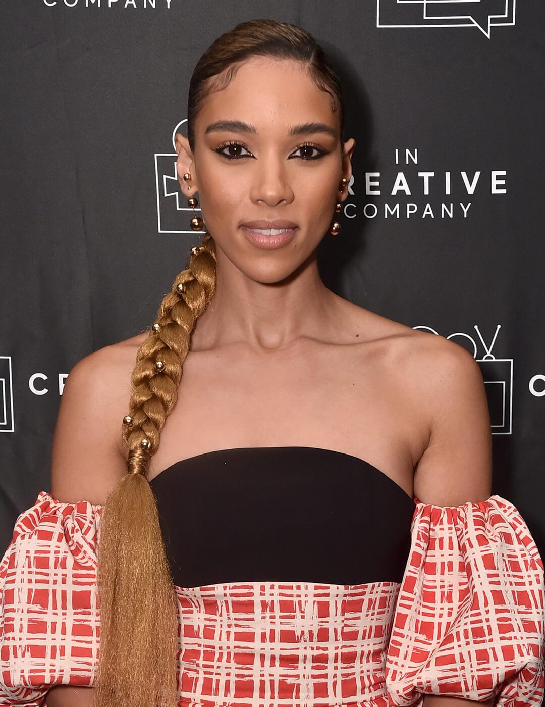 Alexandra Shipp rocking a studded side braided hairstyle Desktop