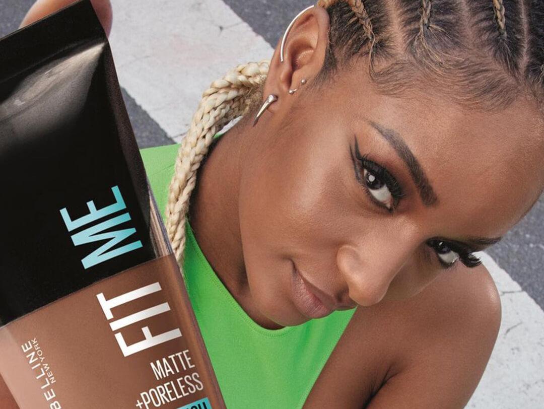 A photo of a model hold a MAYBELLINE NEW YORK Fit Me! Matte + Poreless Foundation Desktop