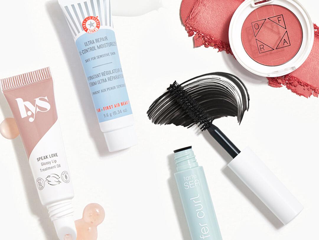 Makeup and skincare products from the December 2021 IPSY Glam Bag swatched on white background Desktop