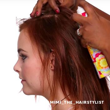 Spritzing hairspray on Haley Fite's crown Mobile