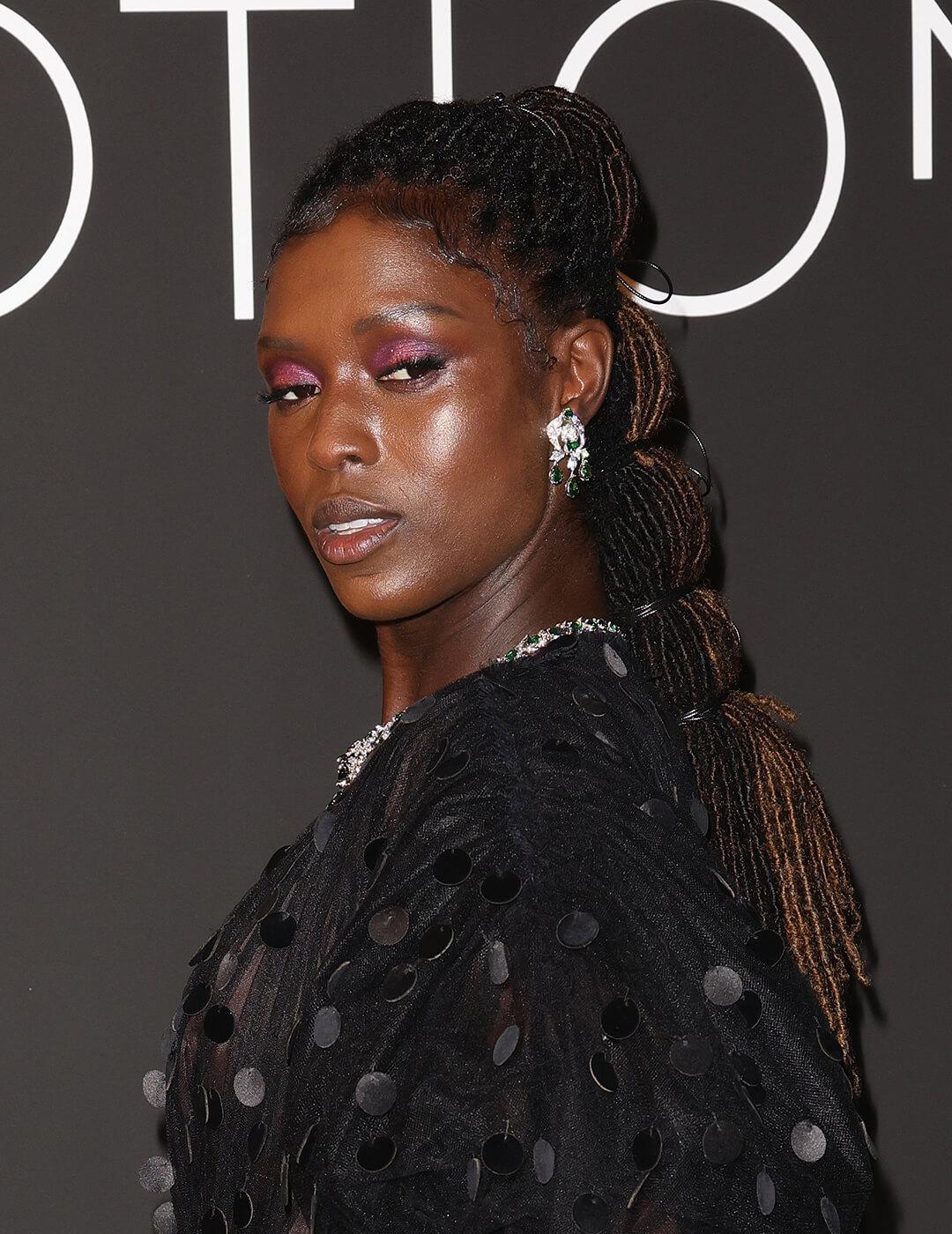 Jodie Turner-Smith looking in braided hairstyle Desktop