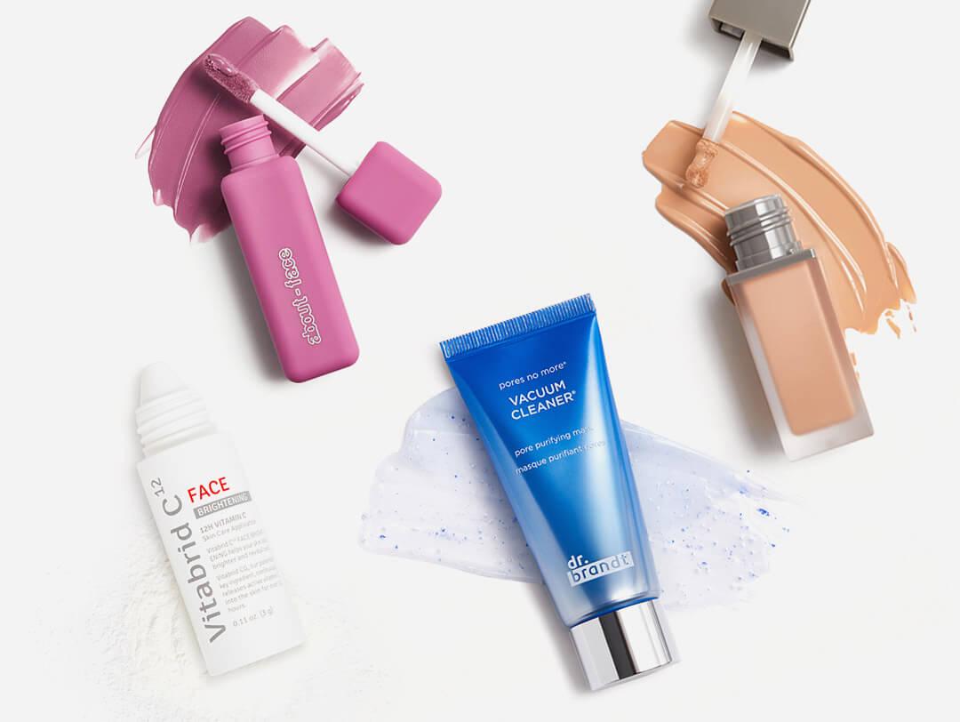 Skincare and makeup products swatched on white background Desktop