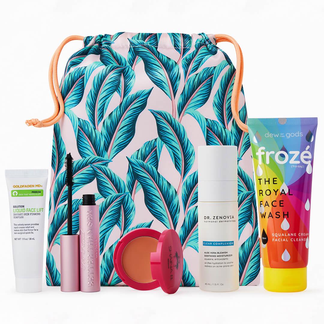 Beauty, makeup, and skincare products from various brands in front of August 2022 IPSY Glam Bag Plus bag against white background Mobile