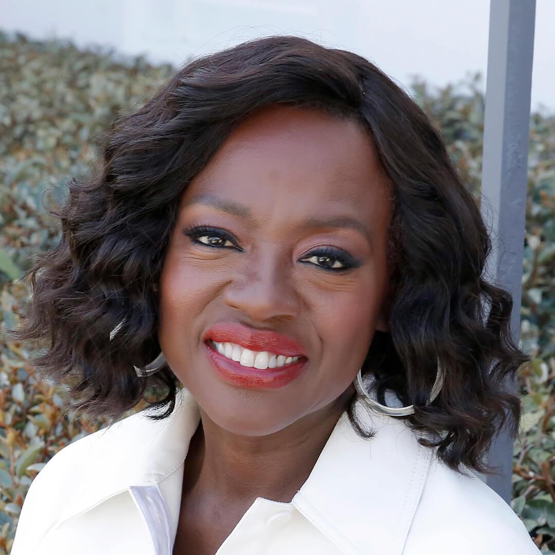 Close-up image of Viola Davis rocking a short and curly hairstyle Desktop