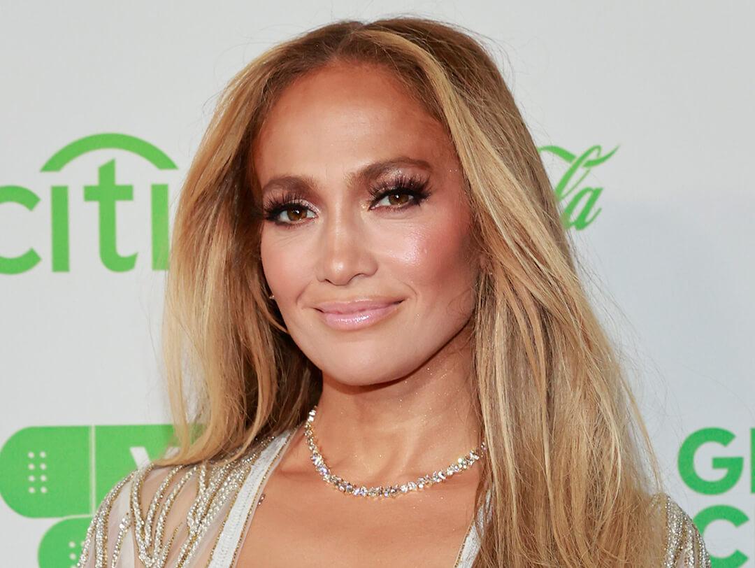 An image of Jennifer Lopez with flashy highlights Desktop