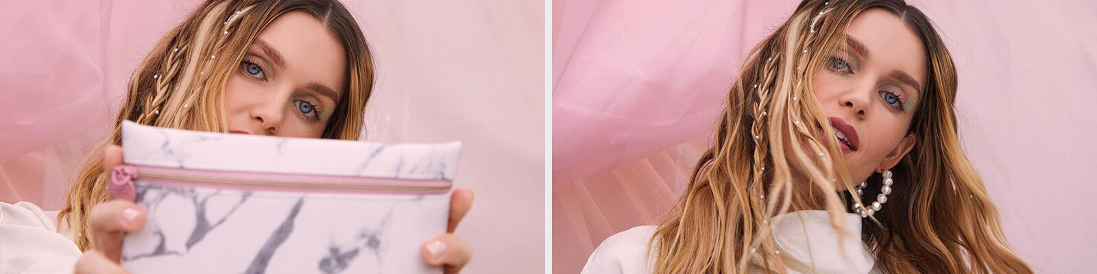 A model holds up the January 2020 Glam Bag. Desktop