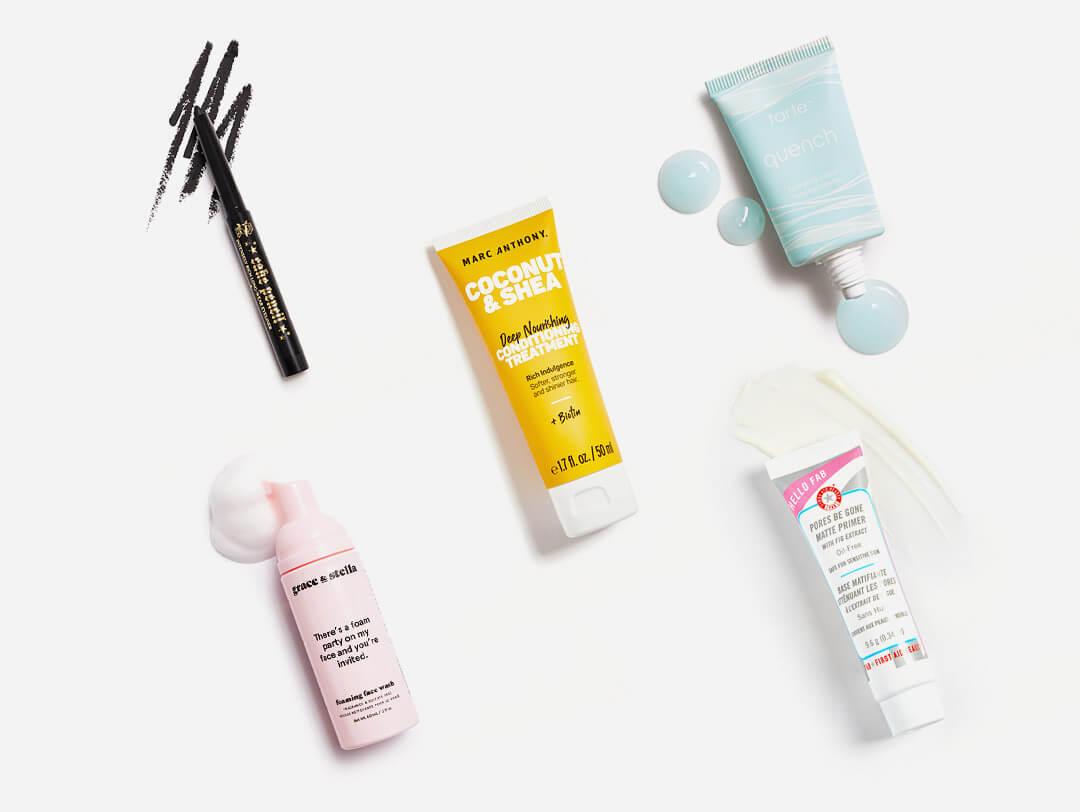 Makeup, hair care, and skincare products from the July 2021 IPSY Glam Bag swatched on white background Desktop