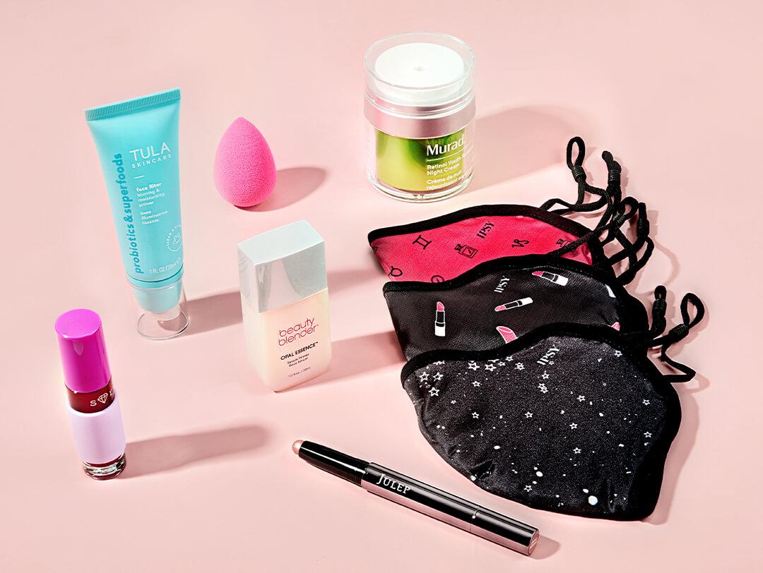 Flat lay image of makeup and skincare products and tools from November 2020 IPSY Glam Bag Plus Ultra Personalization choices Desktop