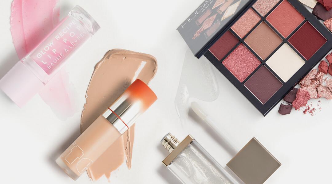 Image of skincare and makeup products swatched on white background Desktop