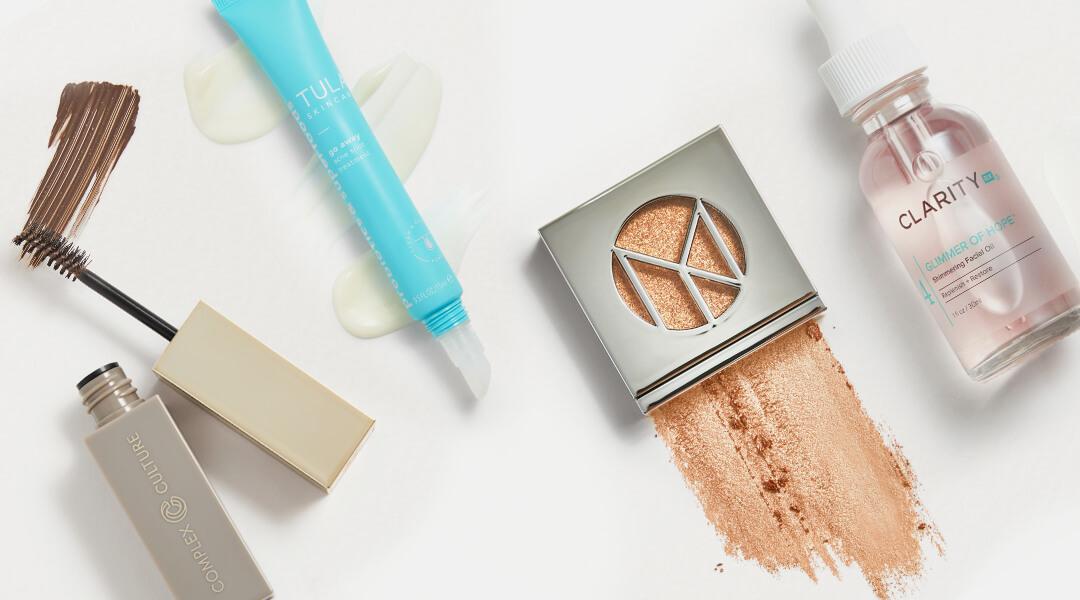 Image of skincare and makeup products swatched on white background Desktop