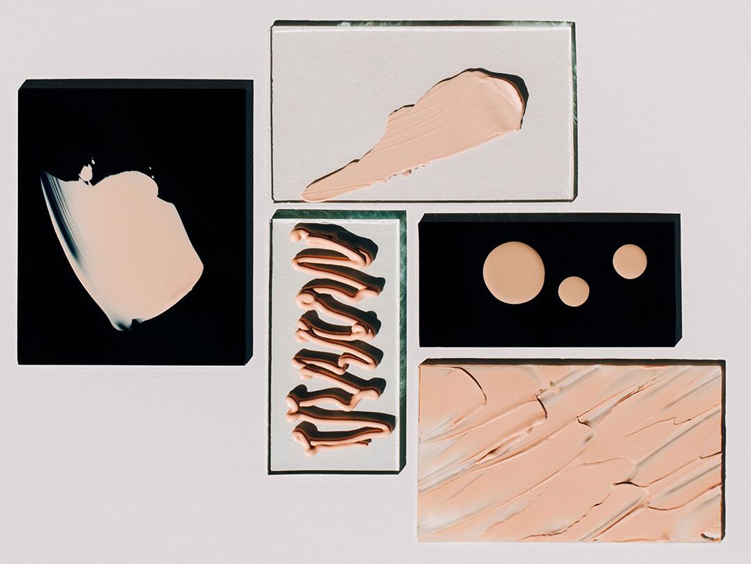 Black and glass slabs with foundation and concealer swatches Desktop