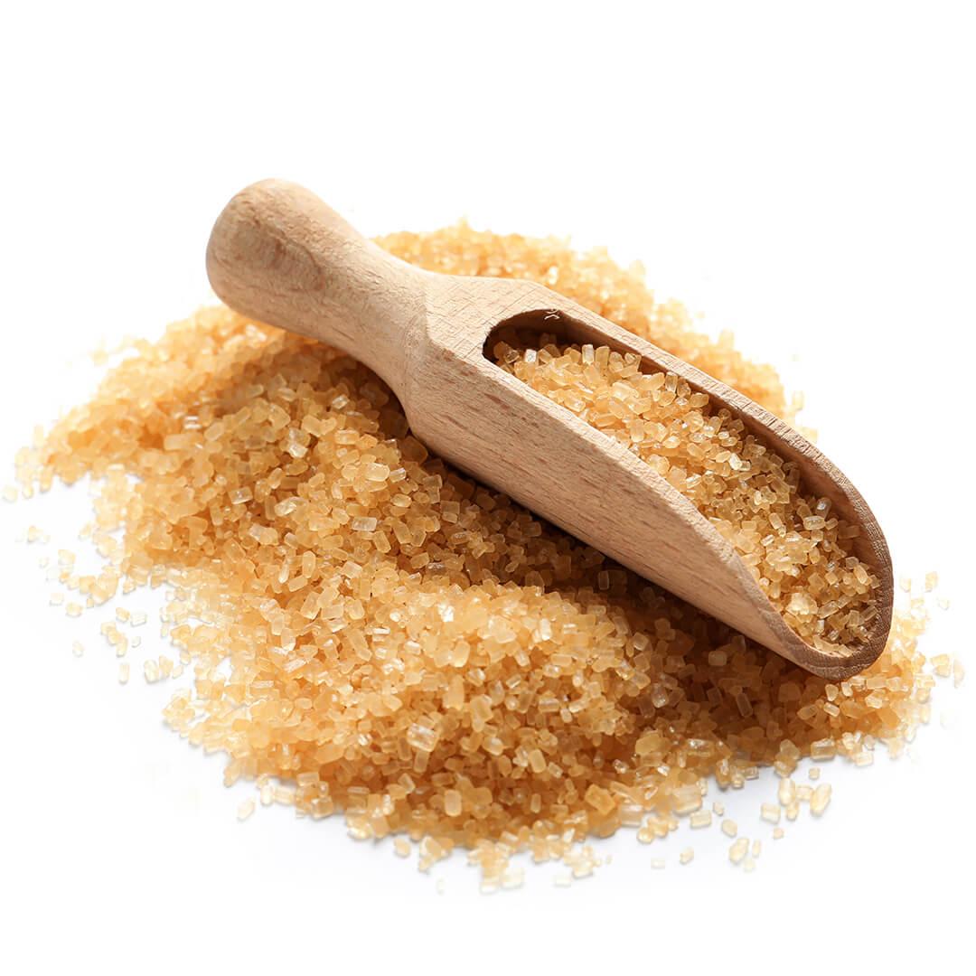 Image of brown sugar and wooden scoop on white background Mobile