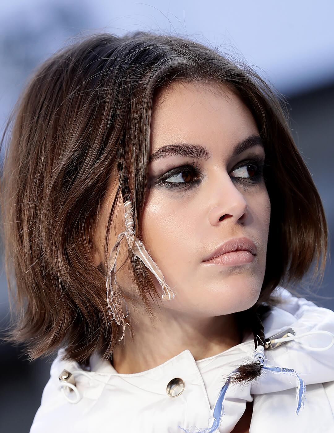 A close-up shot of Kaia Gerber on the runway during the Max Mara fashion show as part of Milan Fashion Week Fall/Winter 2020-2021 Mobile