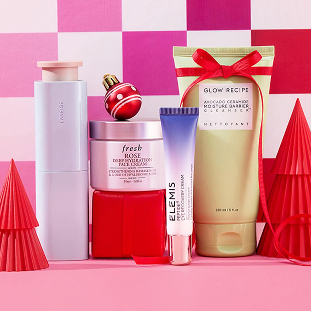 Deep Hydration Bundle products against a checkered pink background Desktop