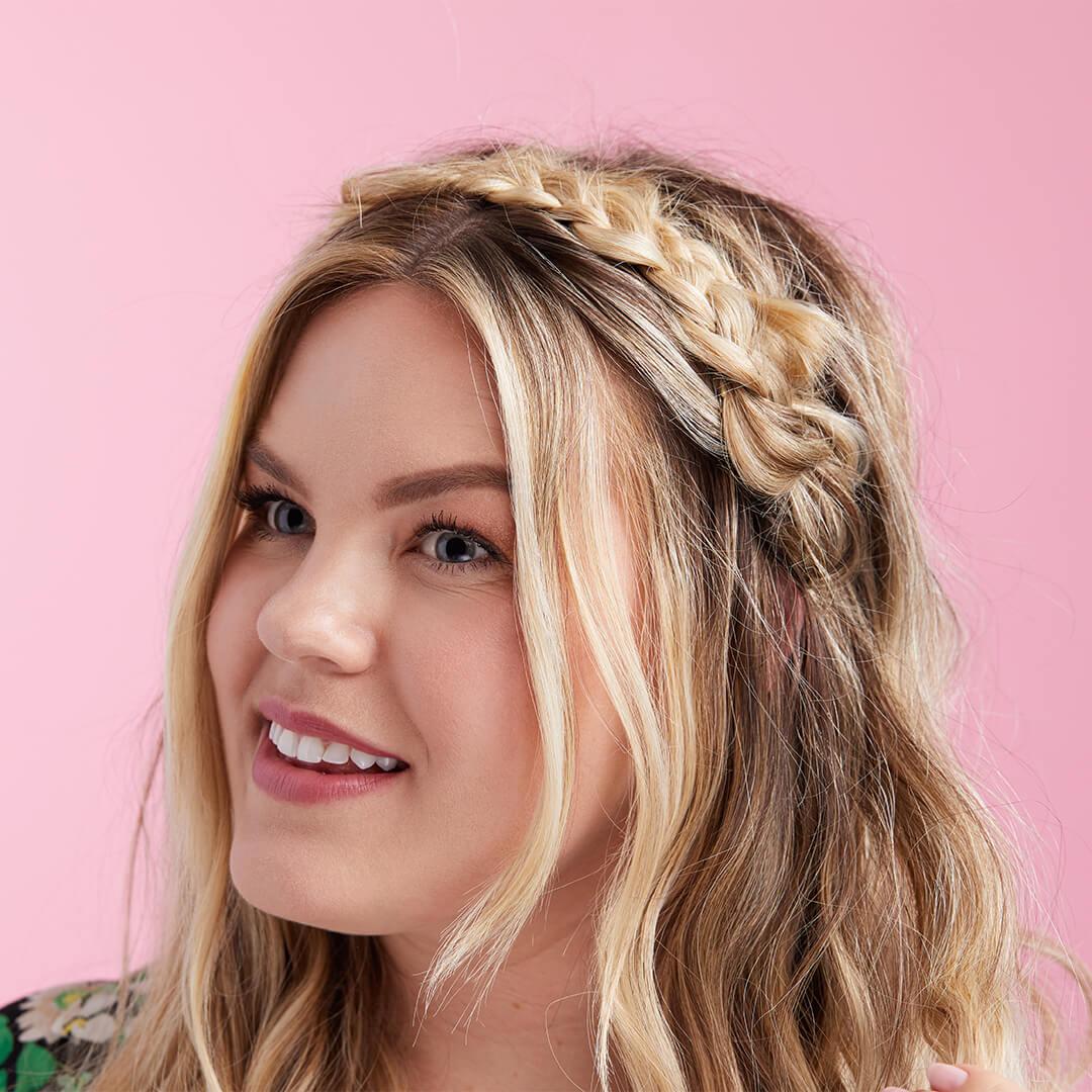An image of a model wearing a braided headband look. Mobile